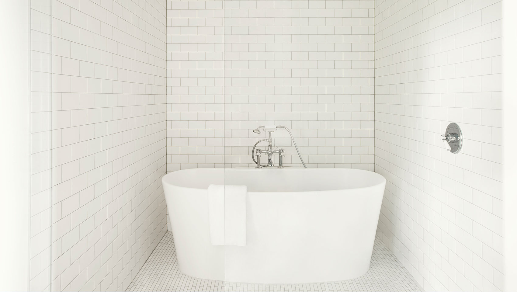 guest bathroom and doorway to room